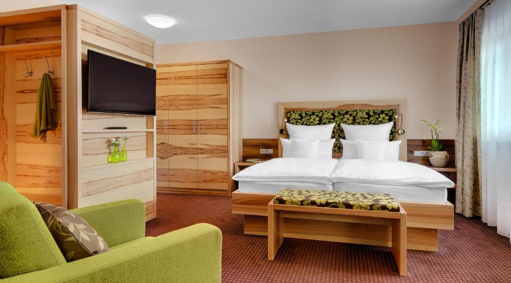 Krevet ili kreveti u jedinici u objektu Hotel der Bäume