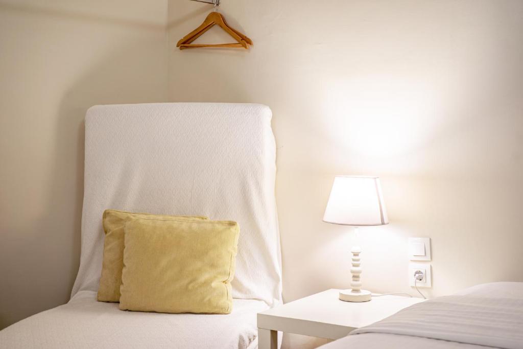 A bed or beds in a room at Zacharitsa APT at Acropolis up 4 guests by LODGESPOT