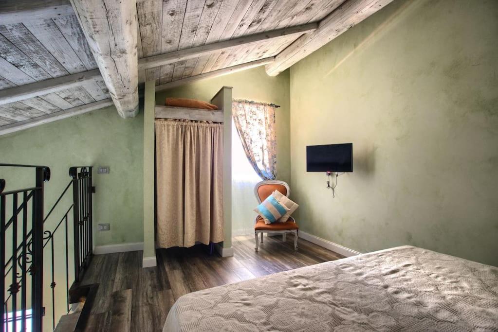 Postel nebo postele na pokoji v ubytování Casa Sale con AC e wifi in borgo ligure