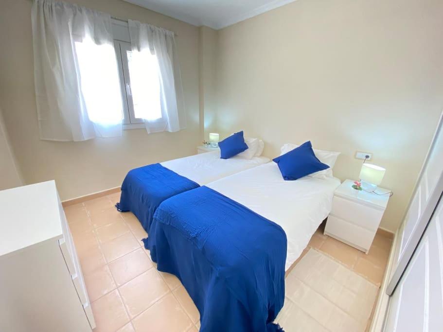 Postel nebo postele na pokoji v ubytování Casa Bongers Altaona Golf