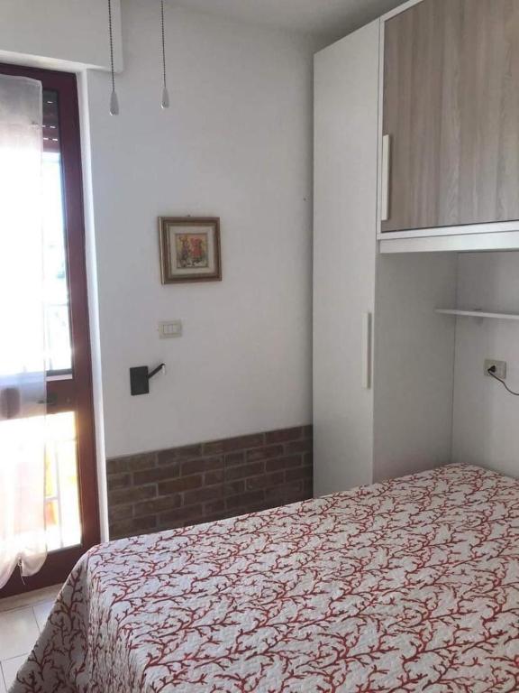 Postel nebo postele na pokoji v ubytování Casa Benedetta
