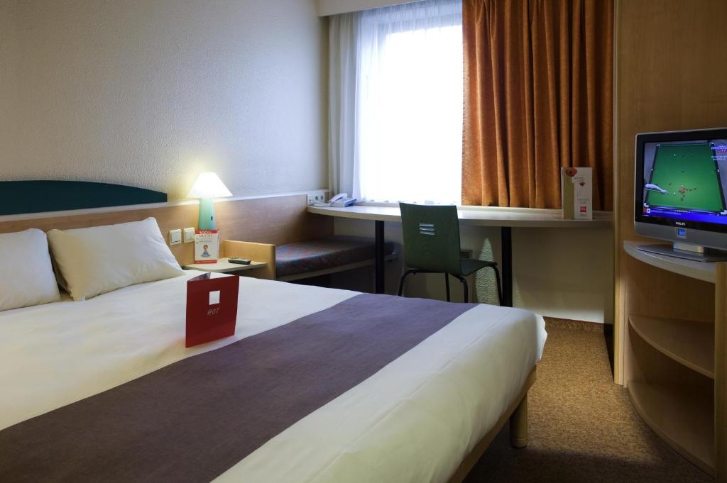 Postel nebo postele na pokoji v ubytování ibis Hotel Brussels Airport