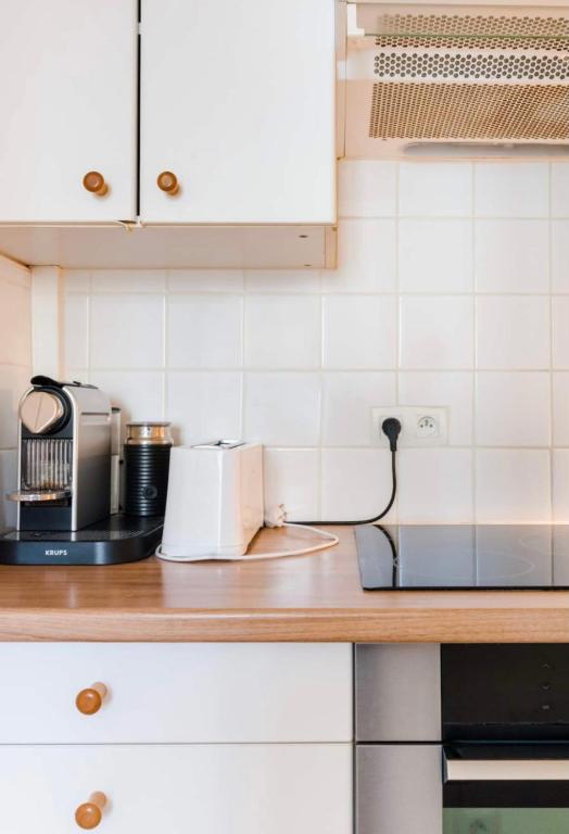 Kuchyňa alebo kuchynka v ubytovaní Magnifique appartement avec cheminée sur la plage