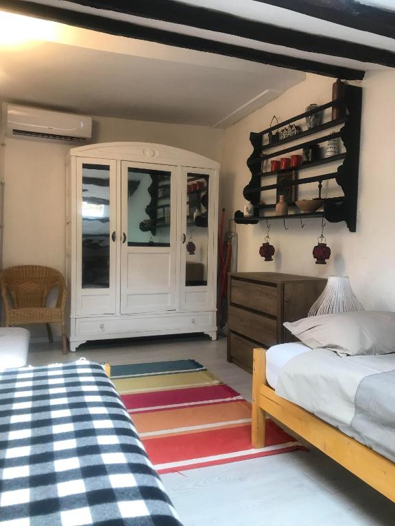 Łóżko lub łóżka w pokoju w obiekcie Casa Lucia