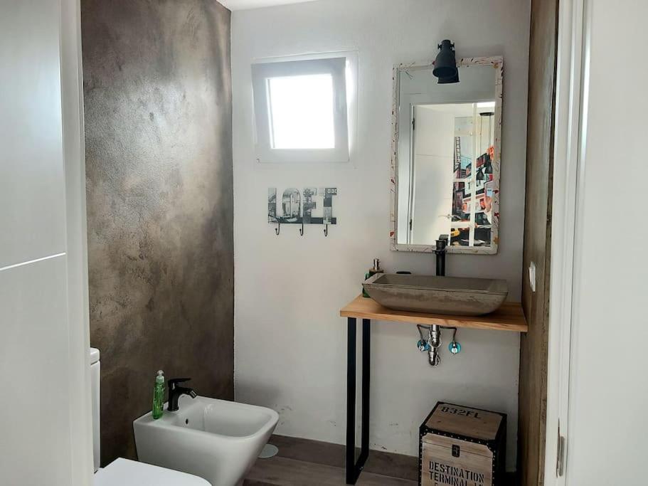 A bathroom at Loft con vista mare