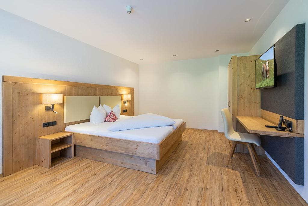 Hotel Garni Romantikにあるベッド