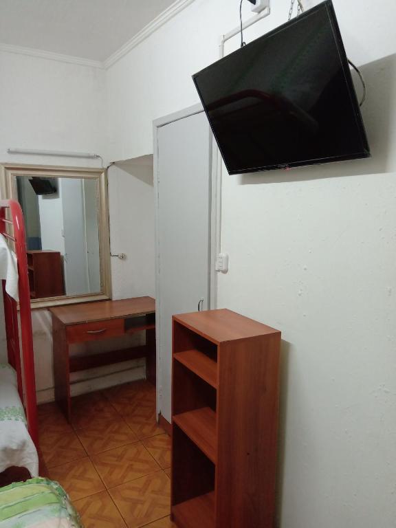 TV a/nebo společenská místnost v ubytování Hotel Capric