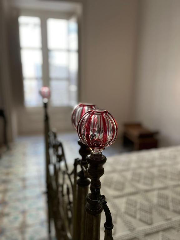 Postel nebo postele na pokoji v ubytování Palazzo Triolo - Dimora di Charme