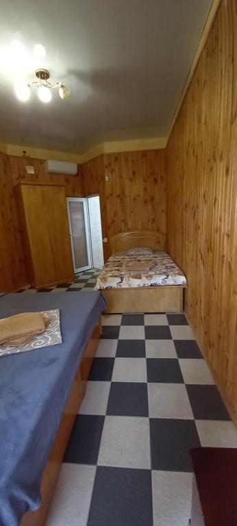 Postel nebo postele na pokoji v ubytování ВИКЕНД