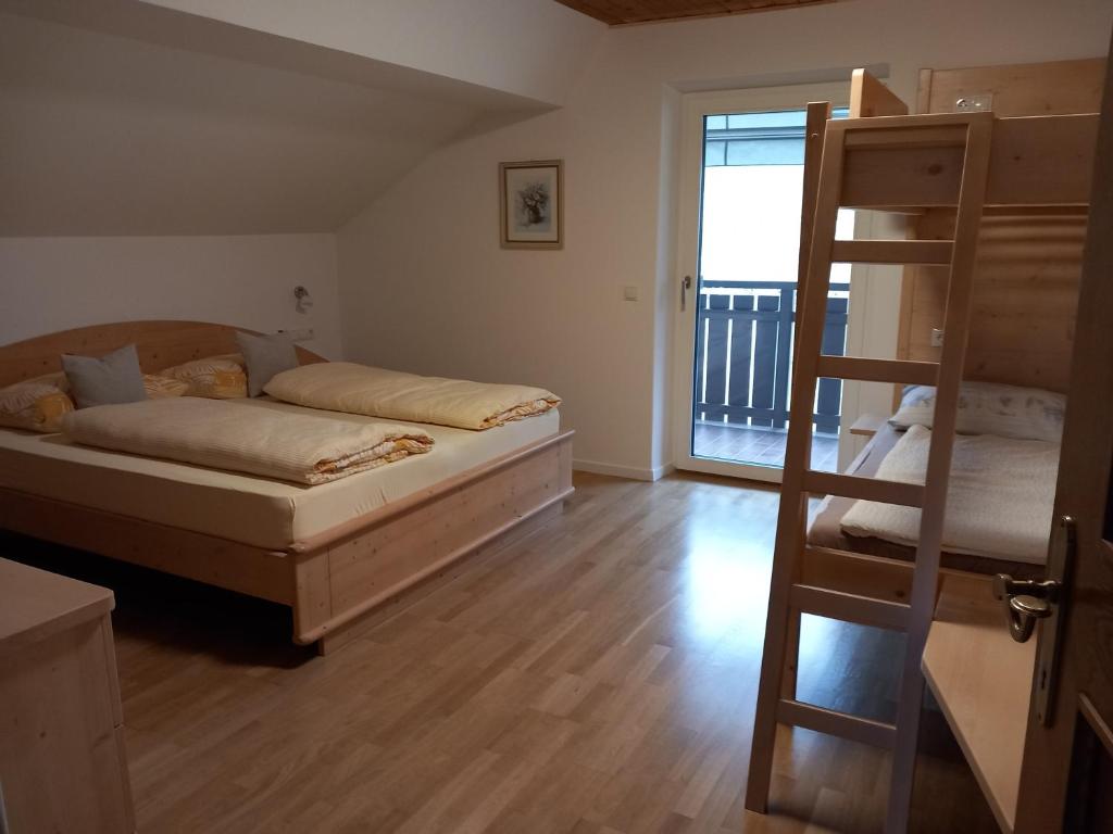 Postel nebo postele na pokoji v ubytování Haus Stolz