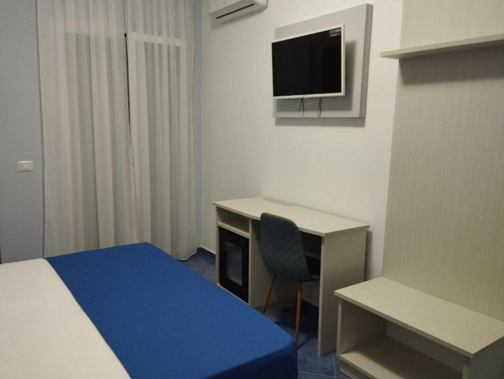 TV a/nebo společenská místnost v ubytování Hotel La Giara