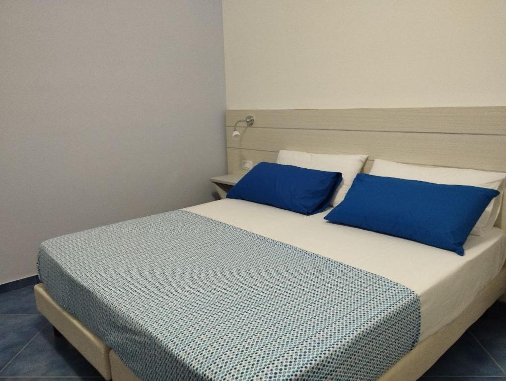 Postel nebo postele na pokoji v ubytování Hotel La Giara