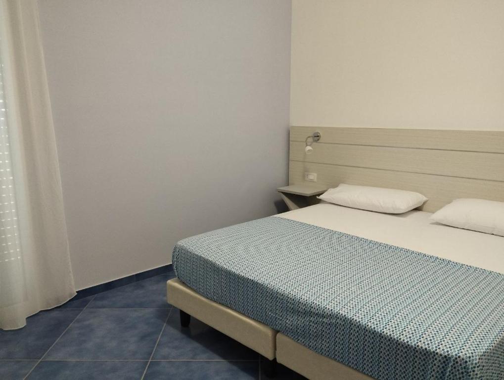 Postel nebo postele na pokoji v ubytování Hotel La Giara