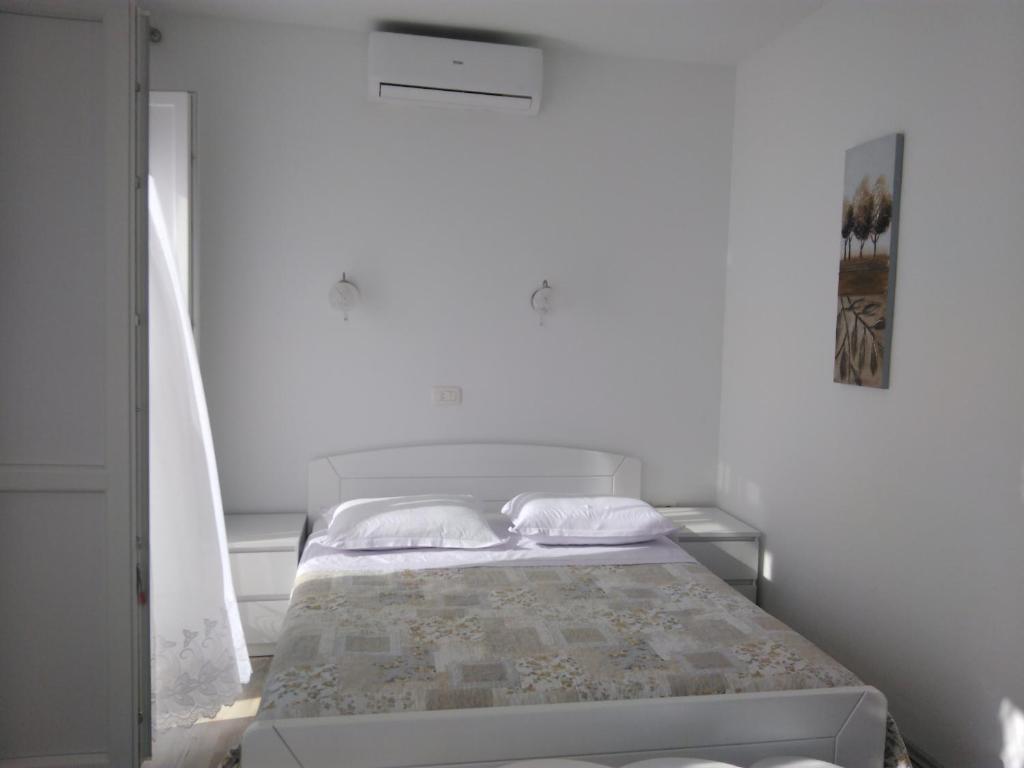 Postel nebo postele na pokoji v ubytování Lemon house