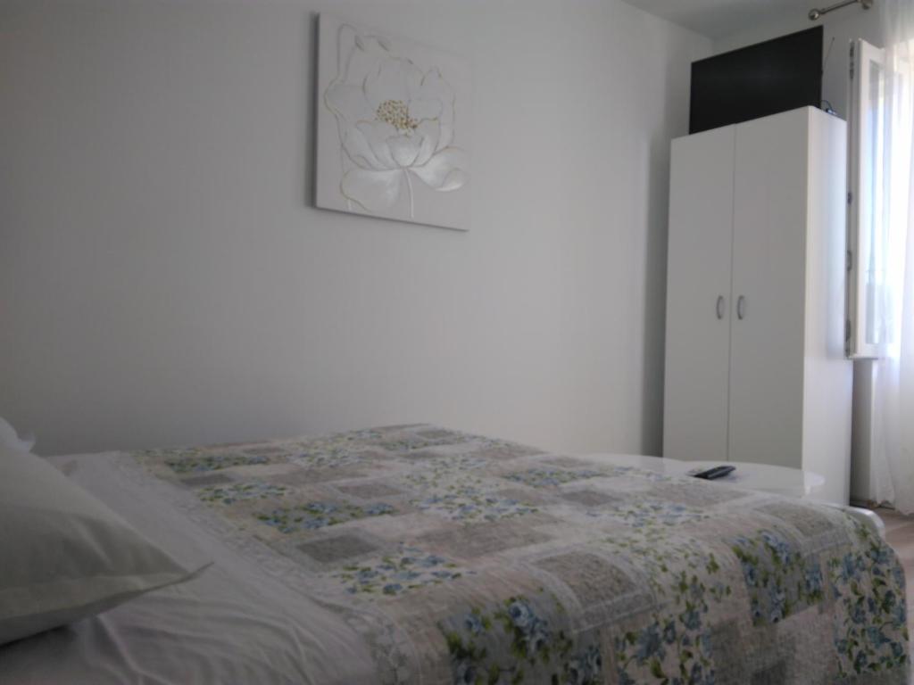 Postel nebo postele na pokoji v ubytování Lemon house