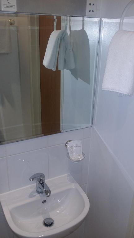 Koupelna v ubytování Arriva Hotel