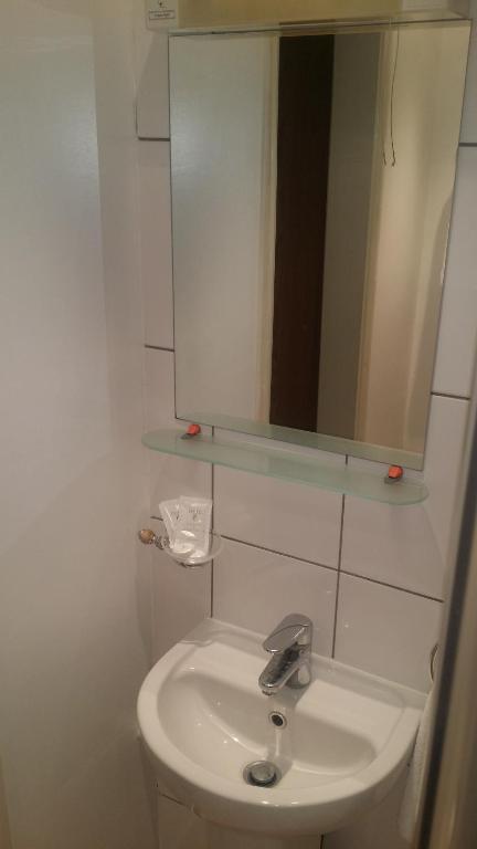 Koupelna v ubytování Arriva Hotel