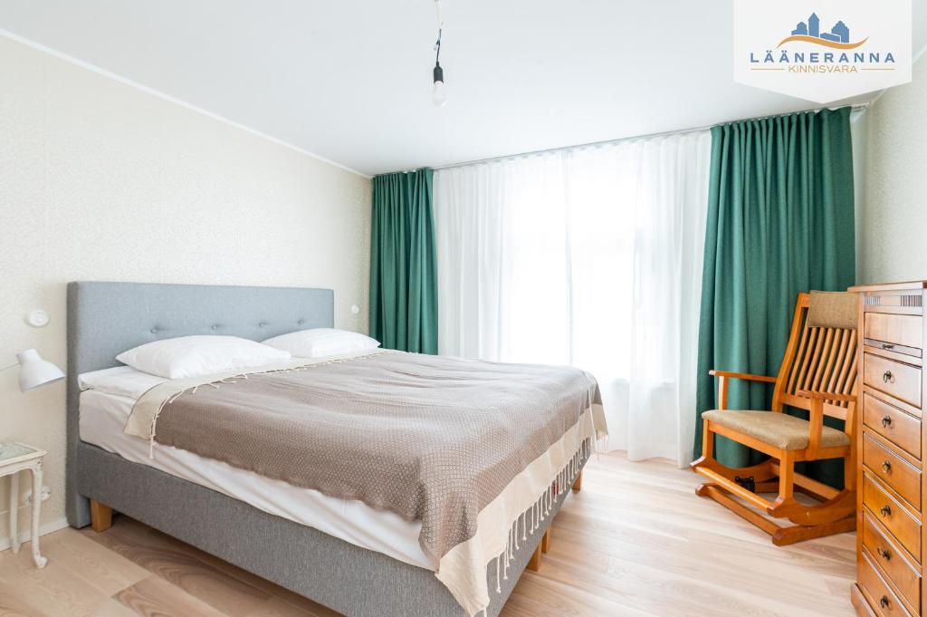 Postel nebo postele na pokoji v ubytování Promenaadi apartament