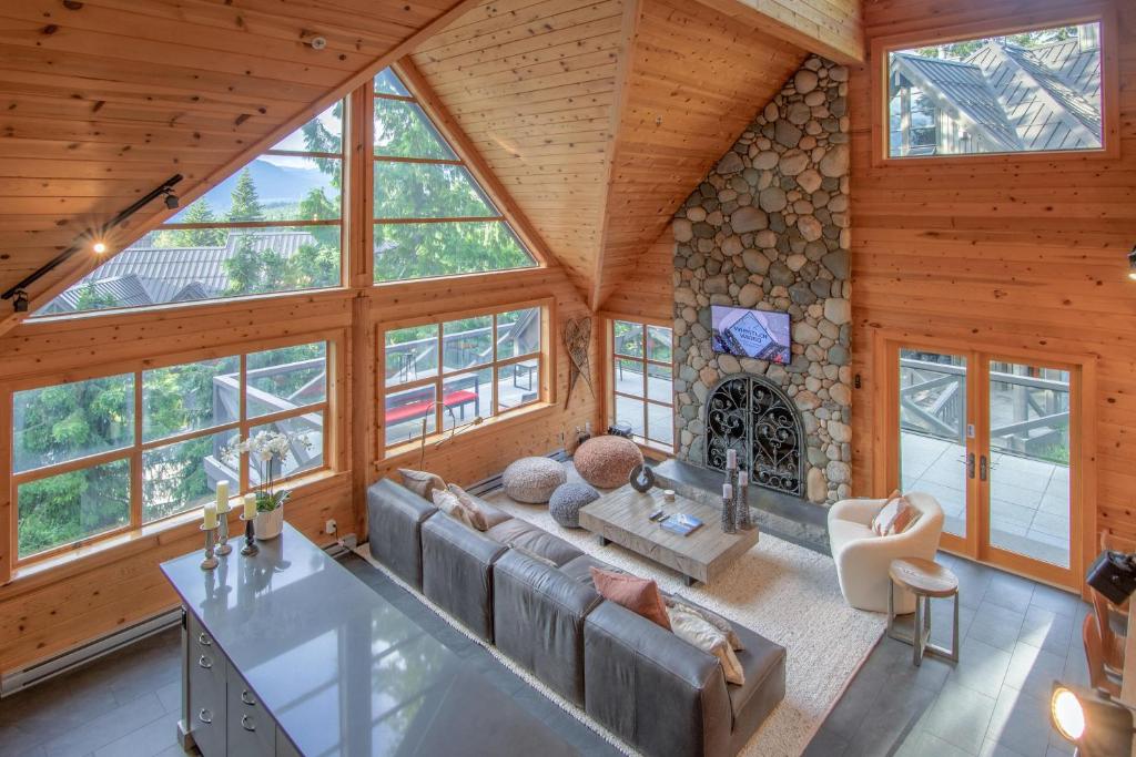 an overhead view of a living room in a log cabin at Pinnacle Ridge 34 - Ski In Ski Out, Private Hot Tub, Recently Renovated, Gas Fireplace in Whistler