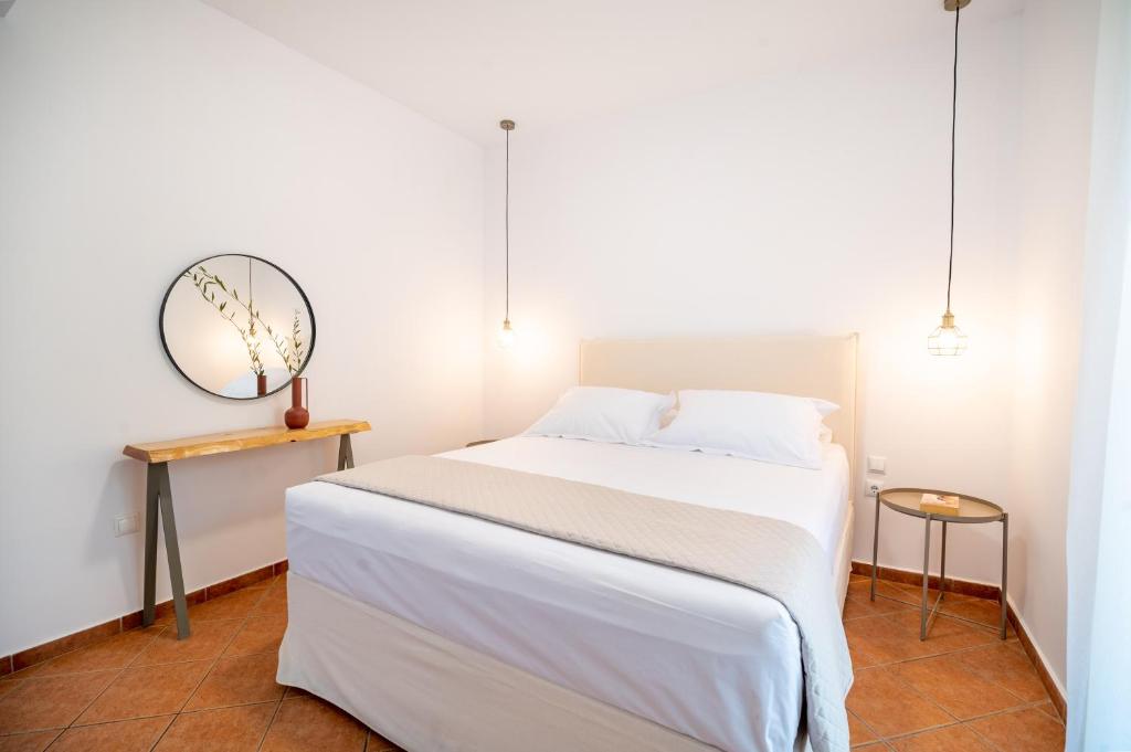 Postel nebo postele na pokoji v ubytování Christoforos Apartments