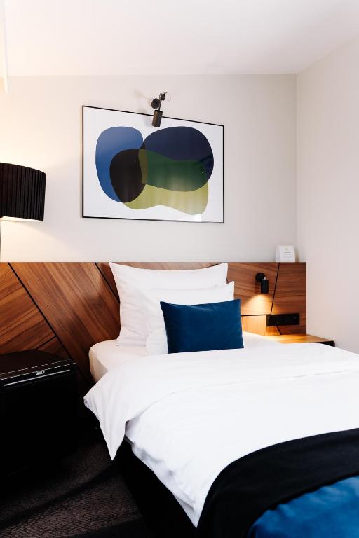 Posteľ alebo postele v izbe v ubytovaní Ascot Premium Hotel