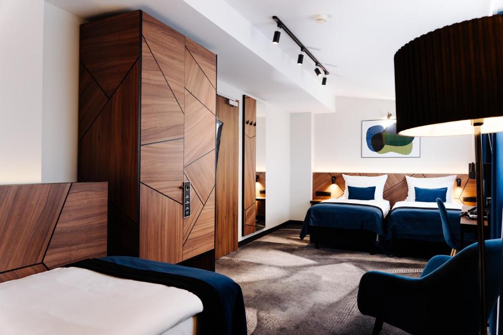 Posteľ alebo postele v izbe v ubytovaní Ascot Premium Hotel