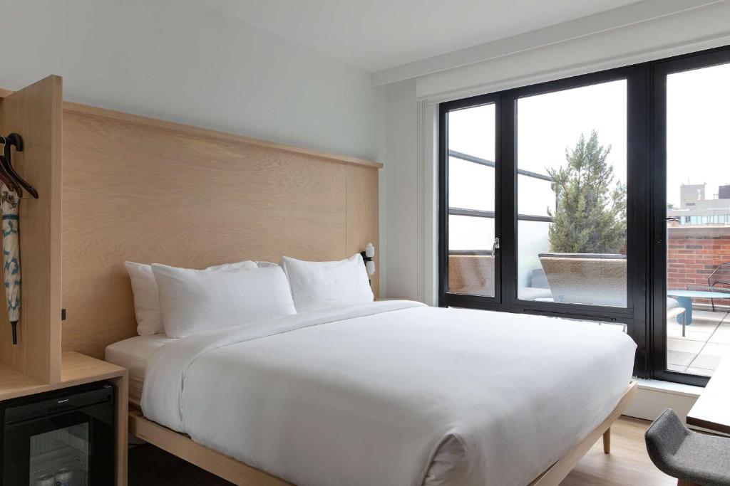 Cama ou camas em um quarto em Arlo SoHo