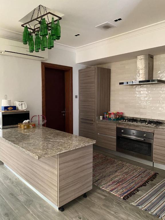 Kuchyň nebo kuchyňský kout v ubytování Wadi Shab/Fins Villa