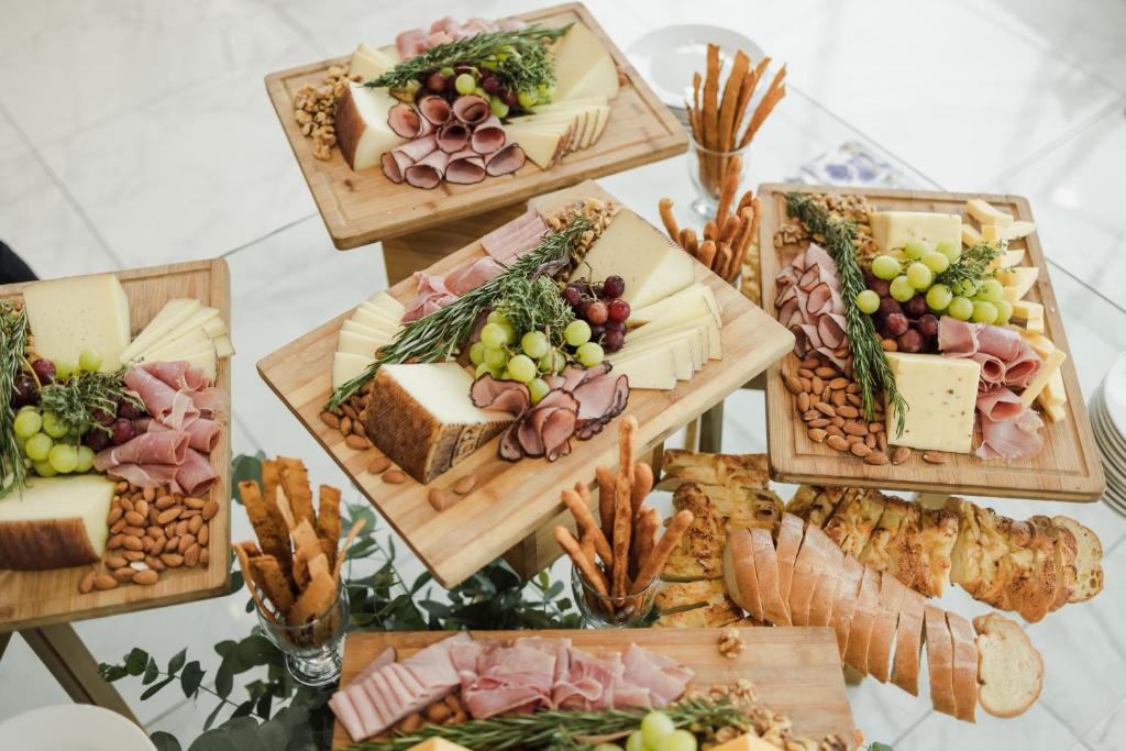 a table topped with lots of different types of food at Copantl Hotel & Convention Center in San Pedro Sula