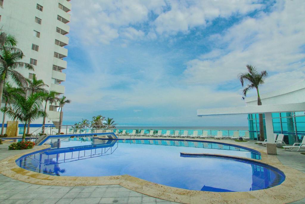 Bazén v ubytování Apartamentos Palmetto - Frente al Mar nebo v jeho okolí