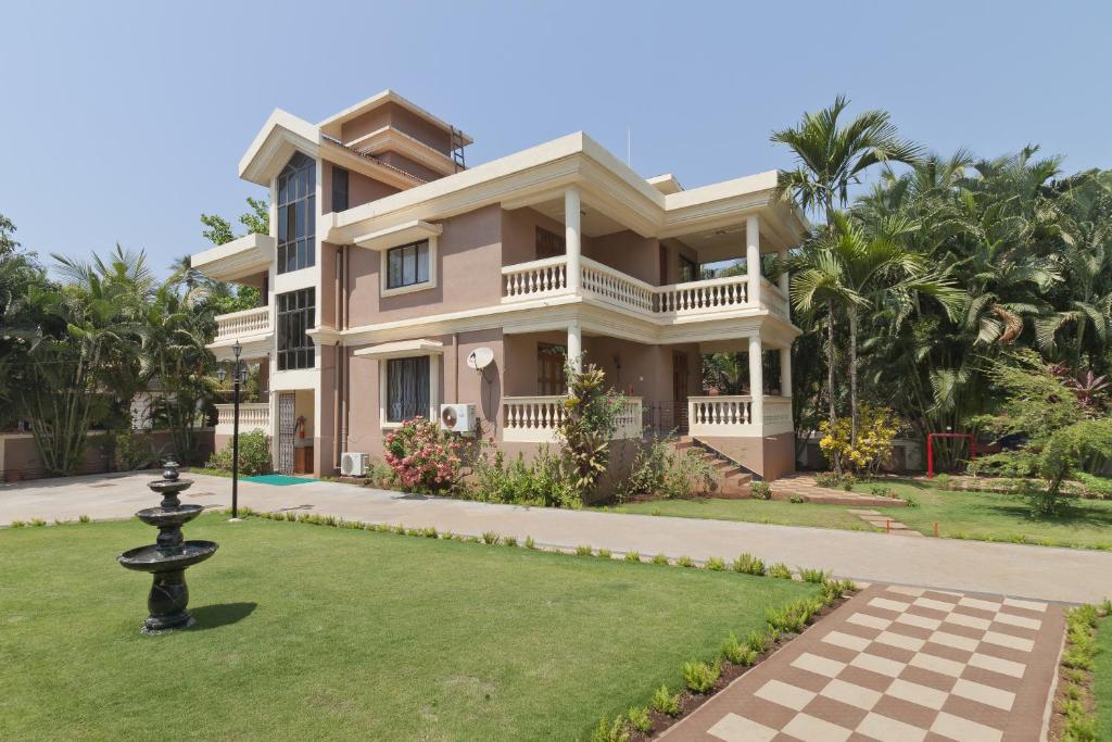 Zahrada ubytování De Mandarin Beach Resort Suites & Villas, Candolim