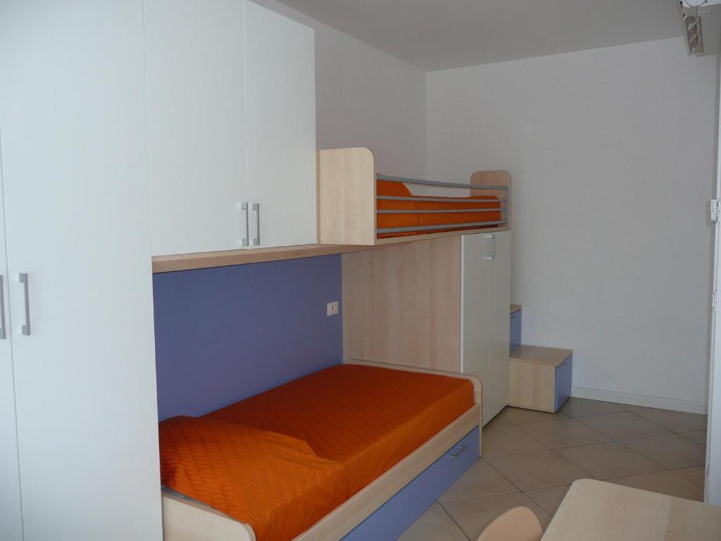Postel nebo postele na pokoji v ubytování Villaggio Sant'Andrea