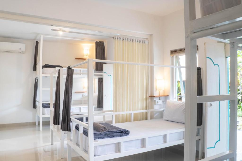 Postel nebo postele na pokoji v ubytování In Da Lodge