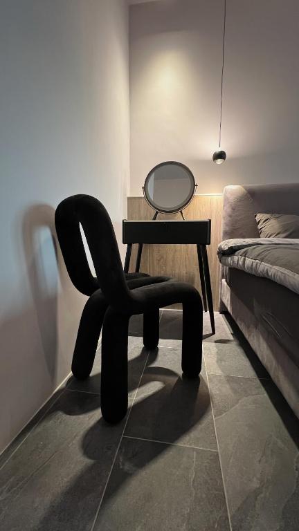 Postel nebo postele na pokoji v ubytování 沒有名字Unnamed B&B