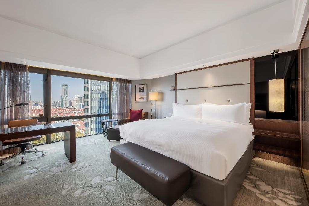 Postel nebo postele na pokoji v ubytování InterContinental Shanghai Pudong by IHG