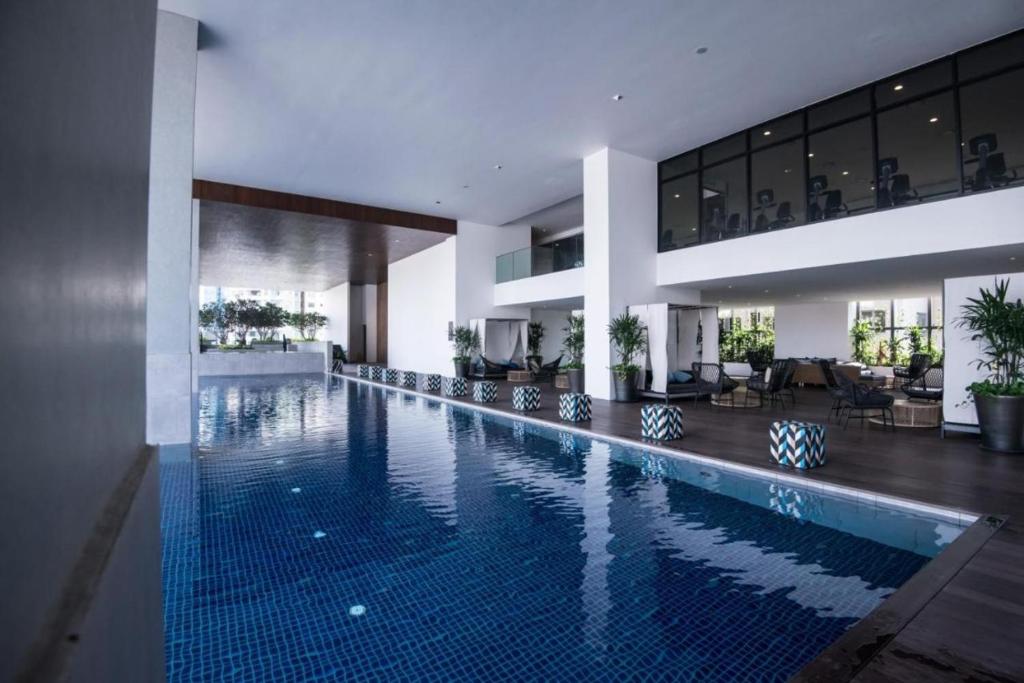 a swimming pool in the middle of a house at EST KL Sentral Bangsar Kuala Lumpur in Kuala Lumpur