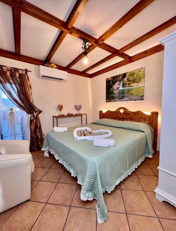 Postel nebo postele na pokoji v ubytování Il Borgo Guest House Subiaco