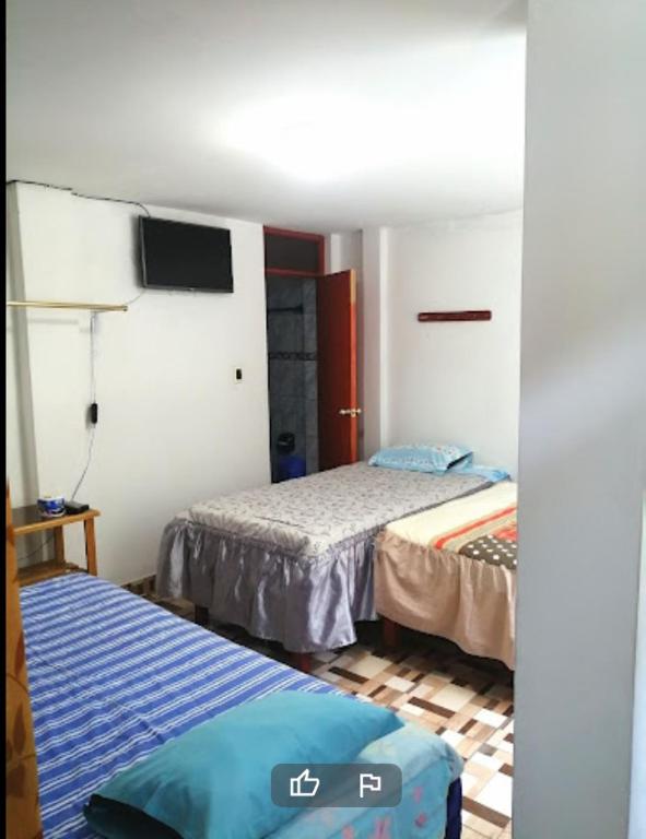 Postel nebo postele na pokoji v ubytování HOSTAL GRAU