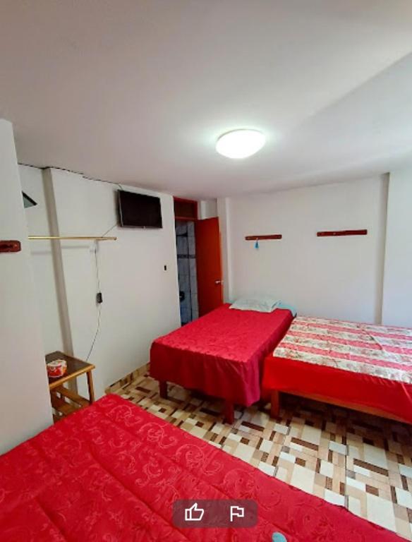 Postel nebo postele na pokoji v ubytování HOSTAL GRAU