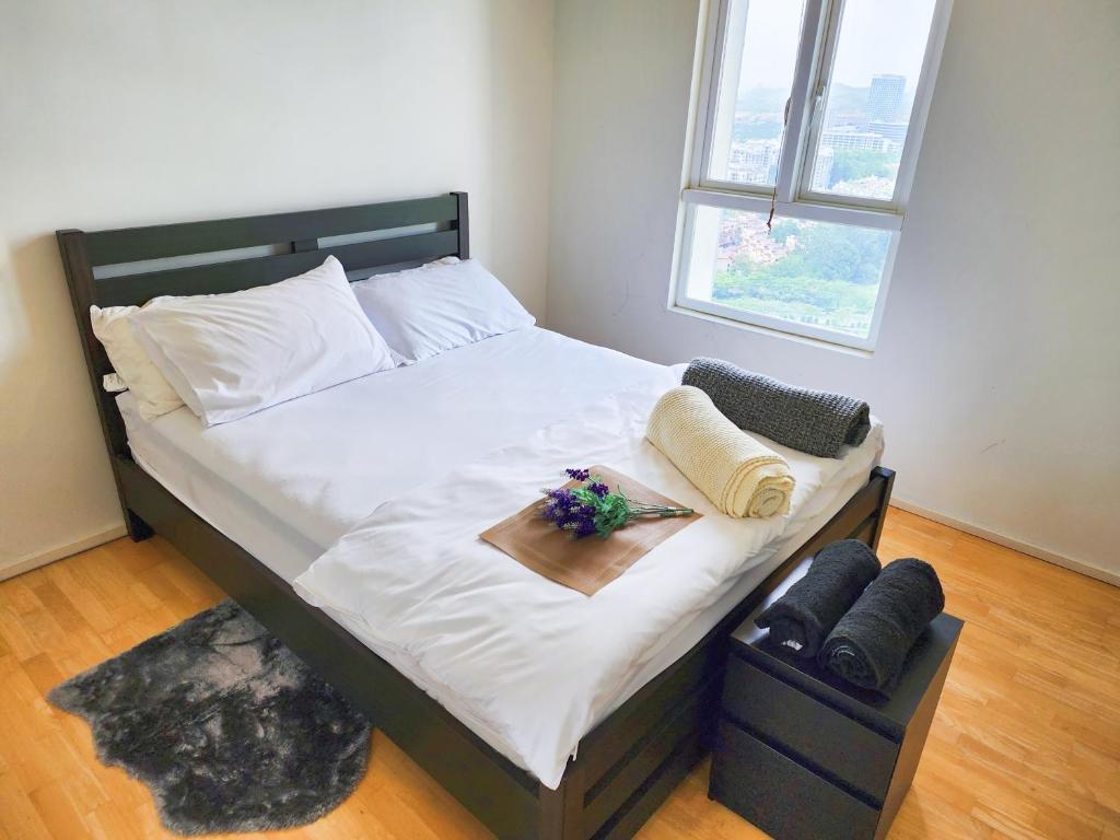 Postel nebo postele na pokoji v ubytování Cyberjaya & Putrajaya VERDI Nature 5 Plus 2 PAX Fully Air-CON