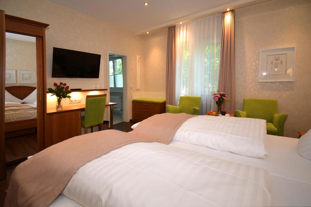 Postel nebo postele na pokoji v ubytování Hotel Anna
