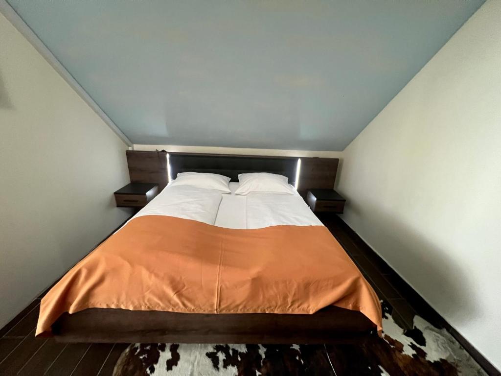 Postel nebo postele na pokoji v ubytování Hotel Strk