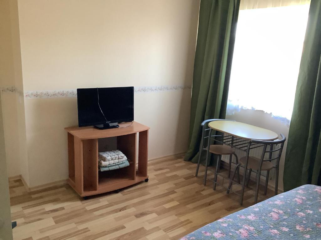 TV a/nebo společenská místnost v ubytování Lana House