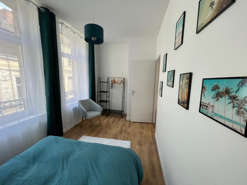Posteľ alebo postele v izbe v ubytovaní Suite Cosy Californienne en Hyper Centre