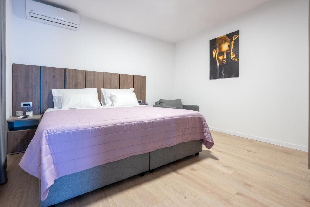 Postel nebo postele na pokoji v ubytování Villa Golden