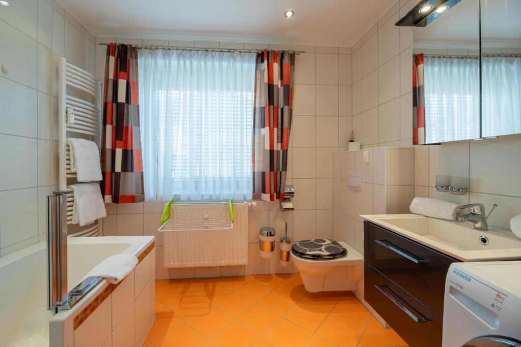 Koupelna v ubytování enJoy Appartements
