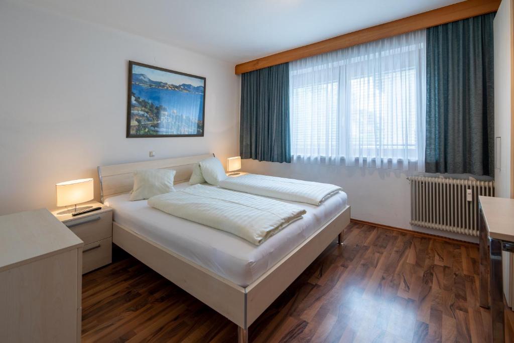 Postel nebo postele na pokoji v ubytování enJoy Appartements