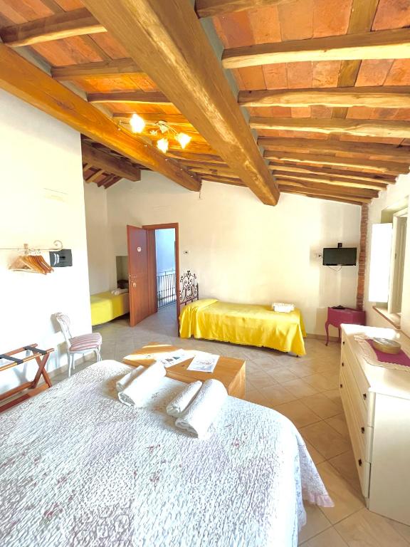 Postel nebo postele na pokoji v ubytování B&B Alloro