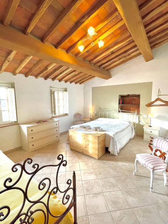 Postel nebo postele na pokoji v ubytování B&B Alloro