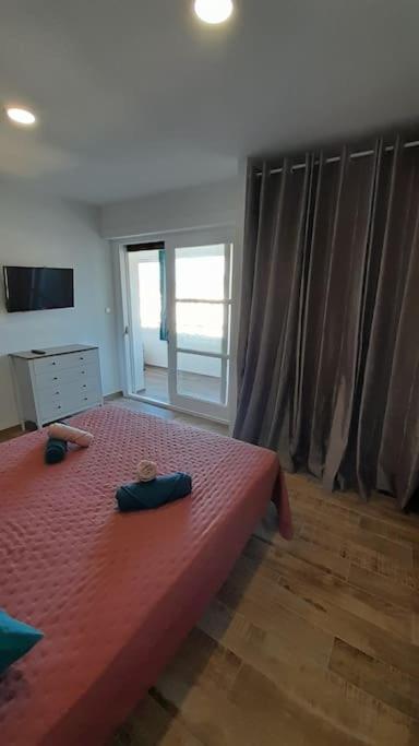 Posteľ alebo postele v izbe v ubytovaní Appartement lumineux et central